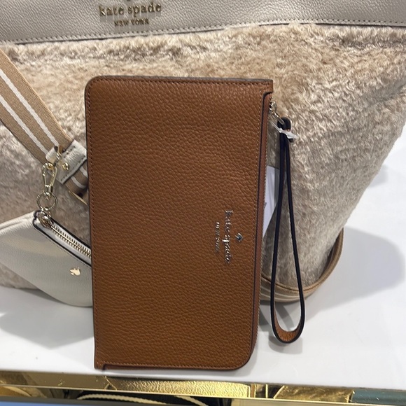 Kate Spade Medium Lucy L-Zip Wristlet Pebble Leather 
COLOR
Warm Gingerbread
NWT - Picture 5 of 16